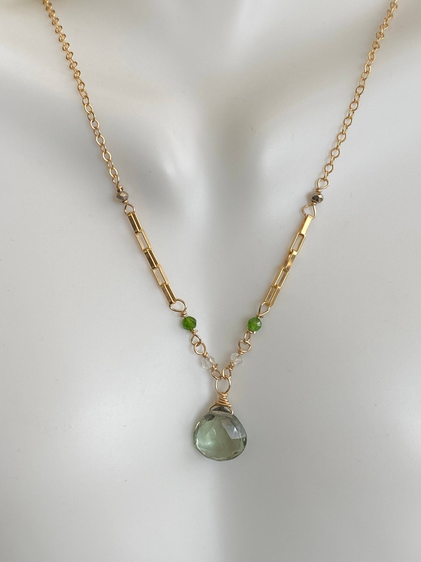 Green amethyst with white topaz, chrome diopside, & pyrite