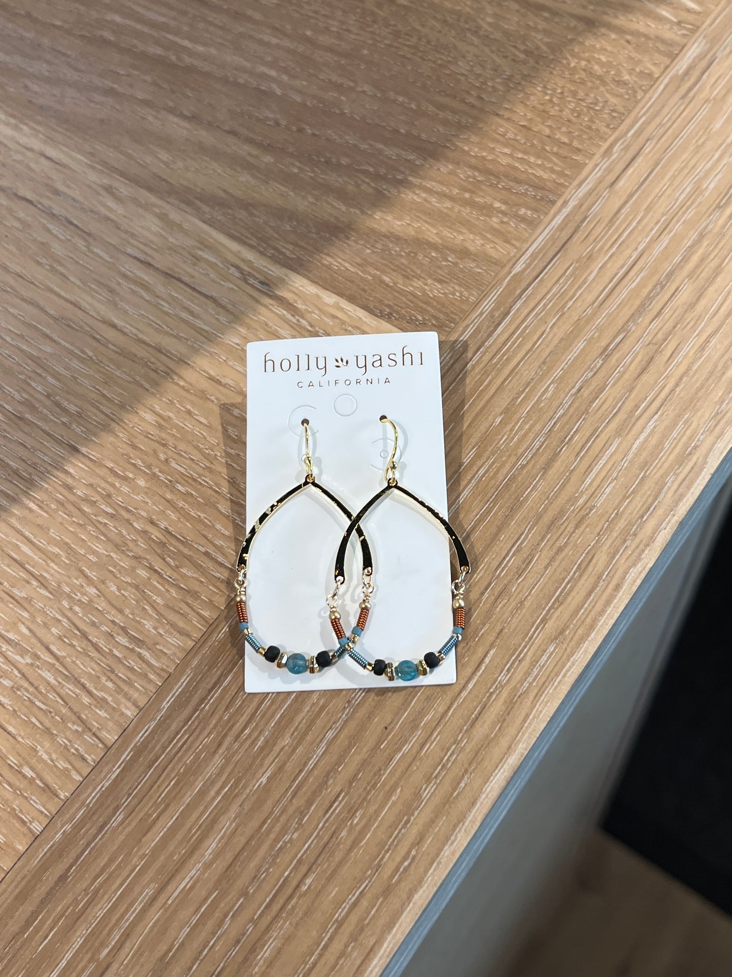 Oval half beaded hoop Earring