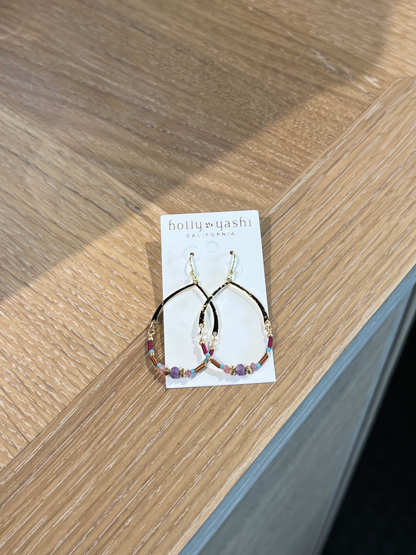 Oval half beaded hoop Earring